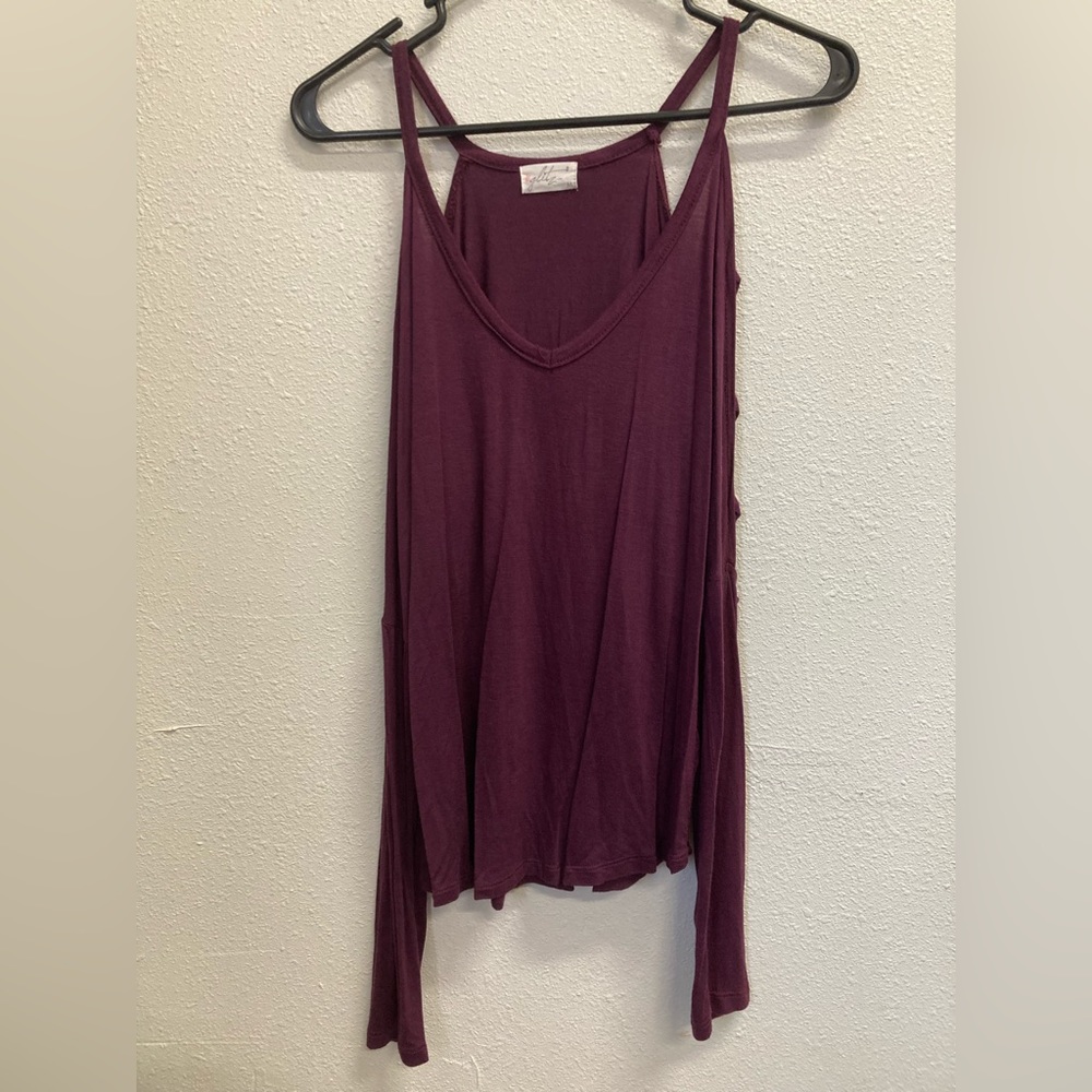 Maroon shirt with slits on the sleeve